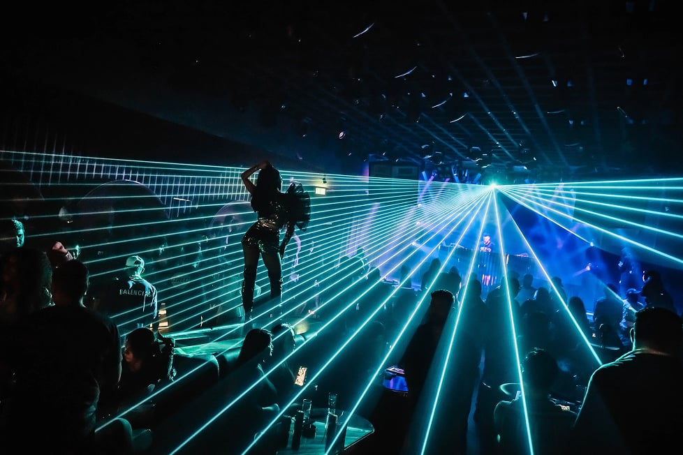 DJ booth with three people